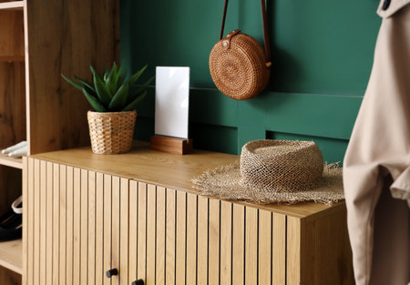 Straw hat on commode in hall, closeupの写真素材