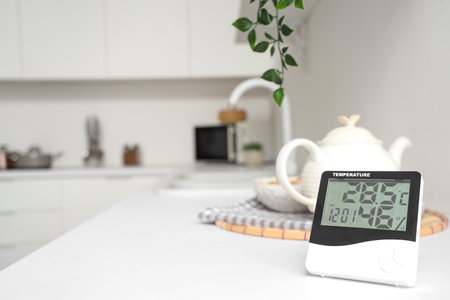 Digital hygrometer on counter in kitchen, closeupの写真素材