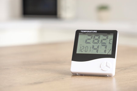 Digital hygrometer on table in kitchen, closeupの写真素材