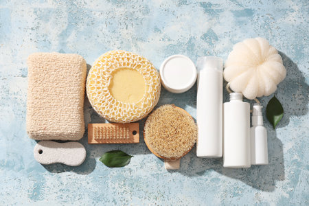Composition with different bath supplies and cosmetic products on color grunge backgroundの写真素材