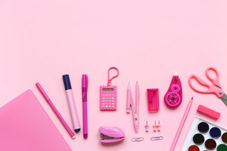Composition with bright stationery on pink backgroundの写真素材