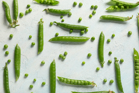 Green peas on light backgroundの写真素材