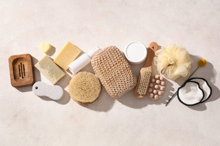 Composition with cosmetic products and bath supplies on light background