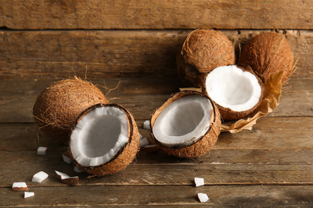 Fresh coconuts on wooden backgroundの写真素材