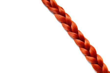 Braided red hair on white background