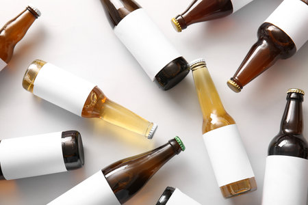 Bottles of cold beer on gray backgroundの写真素材