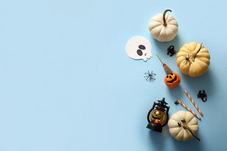 Halloween composition with fresh pumpkins and decor on color backgroundの写真素材