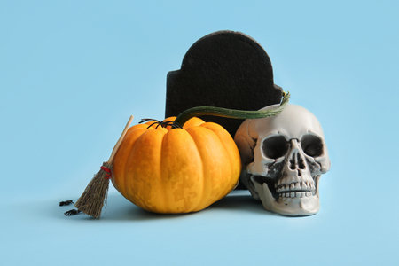 Halloween composition with fresh pumpkin on color backgroundの写真素材