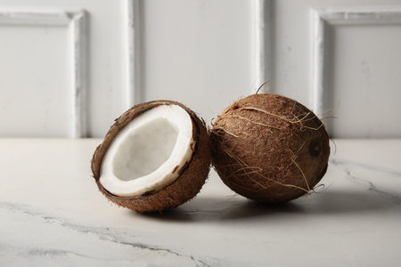 Fresh coconuts on white background