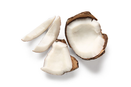 Cut fresh coconut on white background