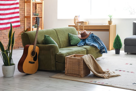 USA flag and comfortable sofa in interior of living room