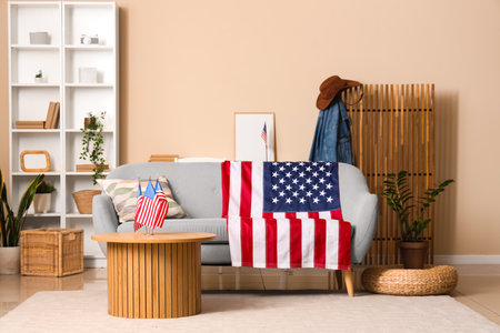 USA flags, sofa and table in interior of living roomの写真素材