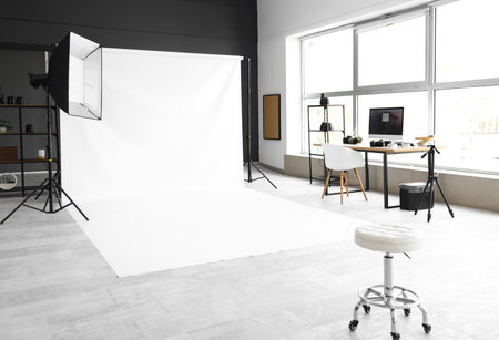 Modern photographer's studio with professional equipmentの写真素材