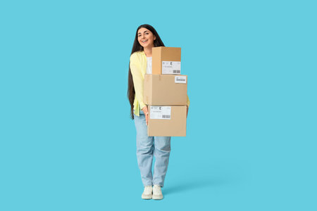 Pregnant online store seller with parcel boxes on blue background