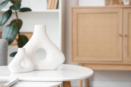 Coffee table with modern vases in living room, closeupの写真素材
