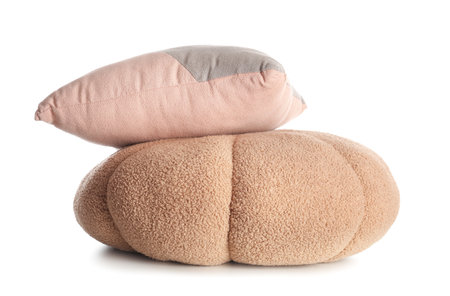 Stylish soft pouf and cushion isolated on white backgroundの写真素材