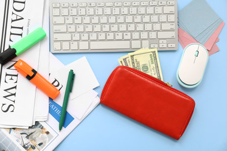 Composition with newspapers, modern gadgets, stationery and money on color backgroundの写真素材