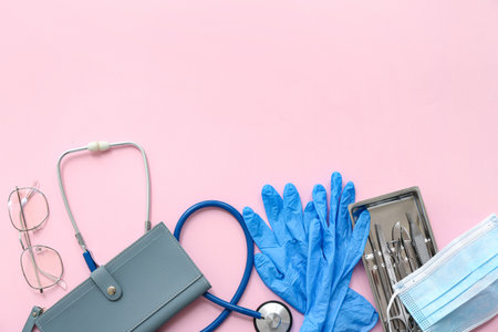 Composition with wallet, medical supplies and surgical instruments on pink backgroundの写真素材