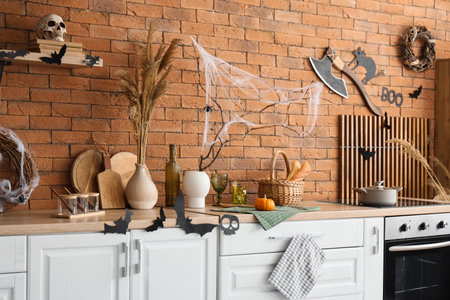 Stylish kitchen decorated for Halloween celebrationの写真素材