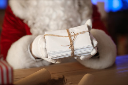 Santa Claus with letters at home on Christmas Eve, closeupの写真素材