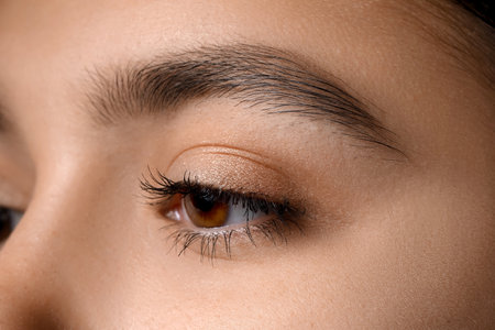 Young woman with beautiful eyebrows, closeupの写真素材