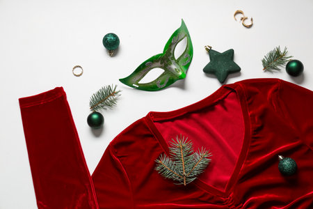 Composition with stylish clothes and Christmas decorations on white backgroundの写真素材