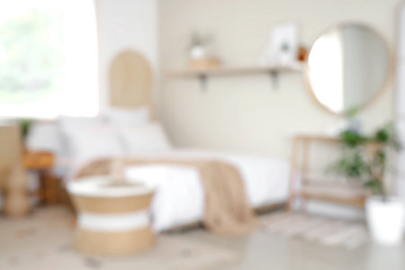 Stylish interior of modern bedroom. Blurred viewの写真素材