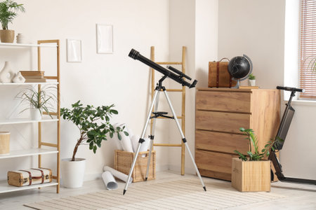 Interior of living room scooter with modern telescope and electricの写真素材
