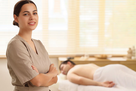 Portrait of female massage therapist in spa salonの写真素材