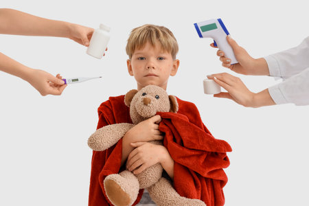 Little boy ill with chickenpox and female hands holding remedy on white background