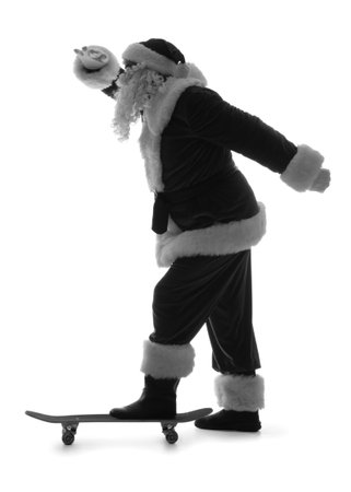 Silhouette of Santa Claus with skateboard on white backgroundの写真素材