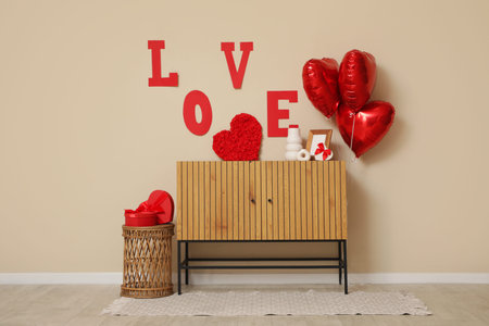 Interior of room decorated for Valentine's Day with commode and balloonsの写真素材