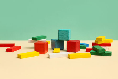 Colorful building blocks and cubes on color backgroundの写真素材