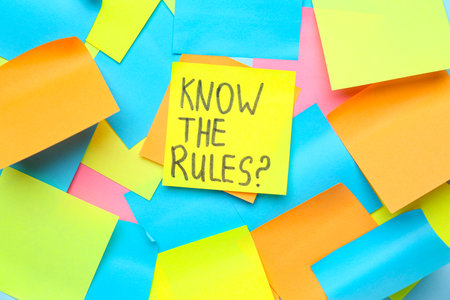 Sticky notes with text KNOW THE RULES?, closeupの写真素材