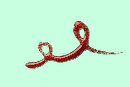Red glitter stroke on green background