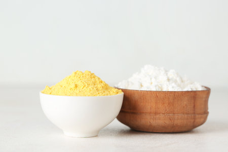 Bowls of powder pigments on light table, closeupの写真素材