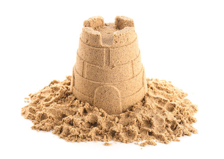 Castle made of sand isolated on white backgroundの写真素材