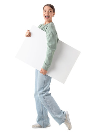 Beautiful young woman with blank poster on white backgroundの写真素材
