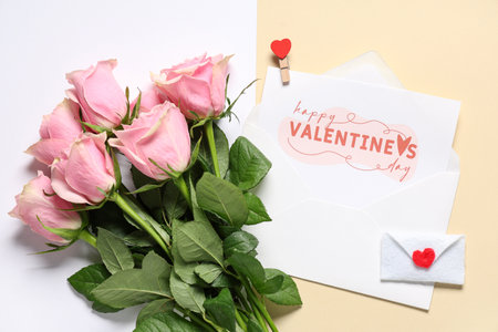 Composition with rose flowers, envelope and greeting card with text HAPPY VALENTINE'S DAY on color background. Valentine's Day celebrationの写真素材