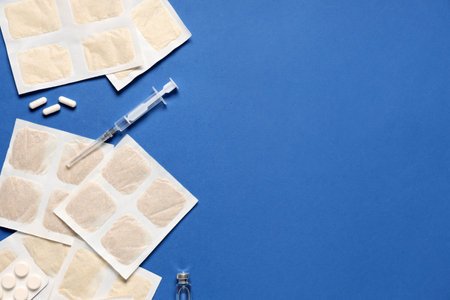 Mustard plasters with medicines on blue backgroundの写真素材
