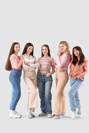 Group of young women on light backgroundの写真素材