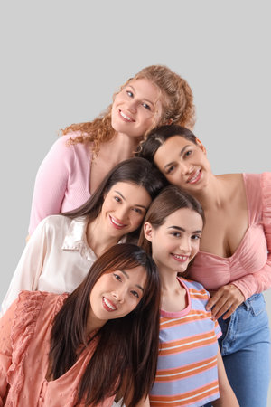 Group of young women on light backgroundの写真素材