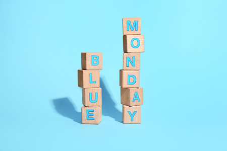 Wooden cubes with text BLUE MONDAYの写真素材