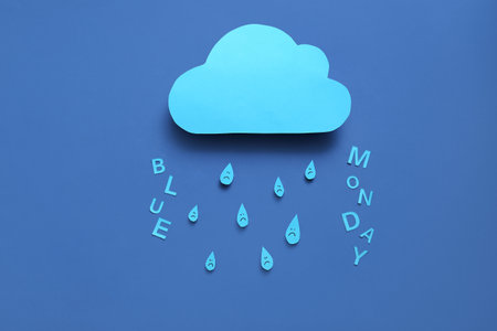 Paper cloud with rain drops and text BLUE MONDAYの写真素材