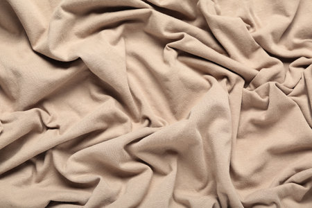 Texture of beige fabric as backgroundの写真素材