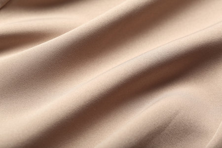 Texture of beige fabric as backgroundの写真素材