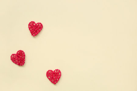 Heart shaped decorations on beige background. Valentine's Day celebrationの写真素材