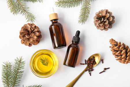 Coniferous cone essential oil on white backgroundの写真素材