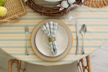 Stylish table setting for Easter celebration. Top view