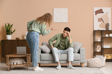 Unhappy couple quarreling at homeの写真素材